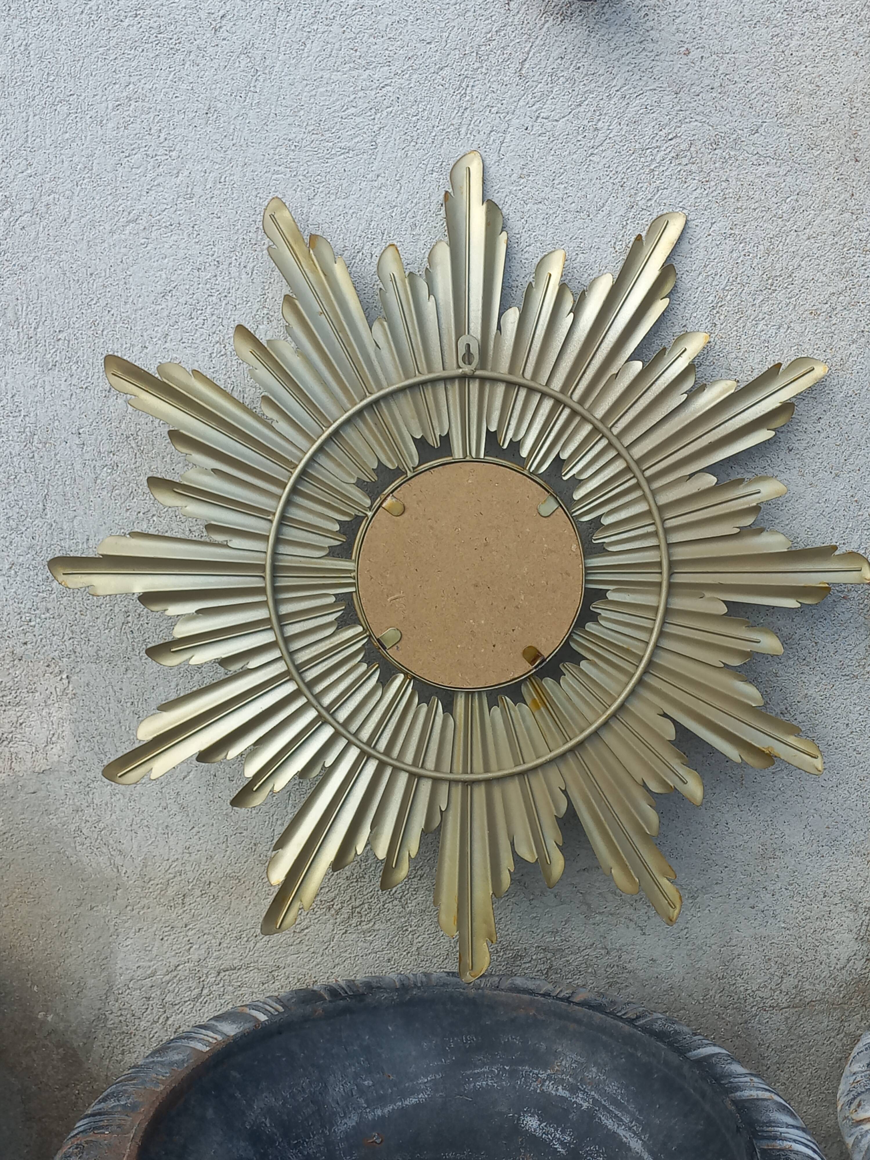 Gold metal sun mirror