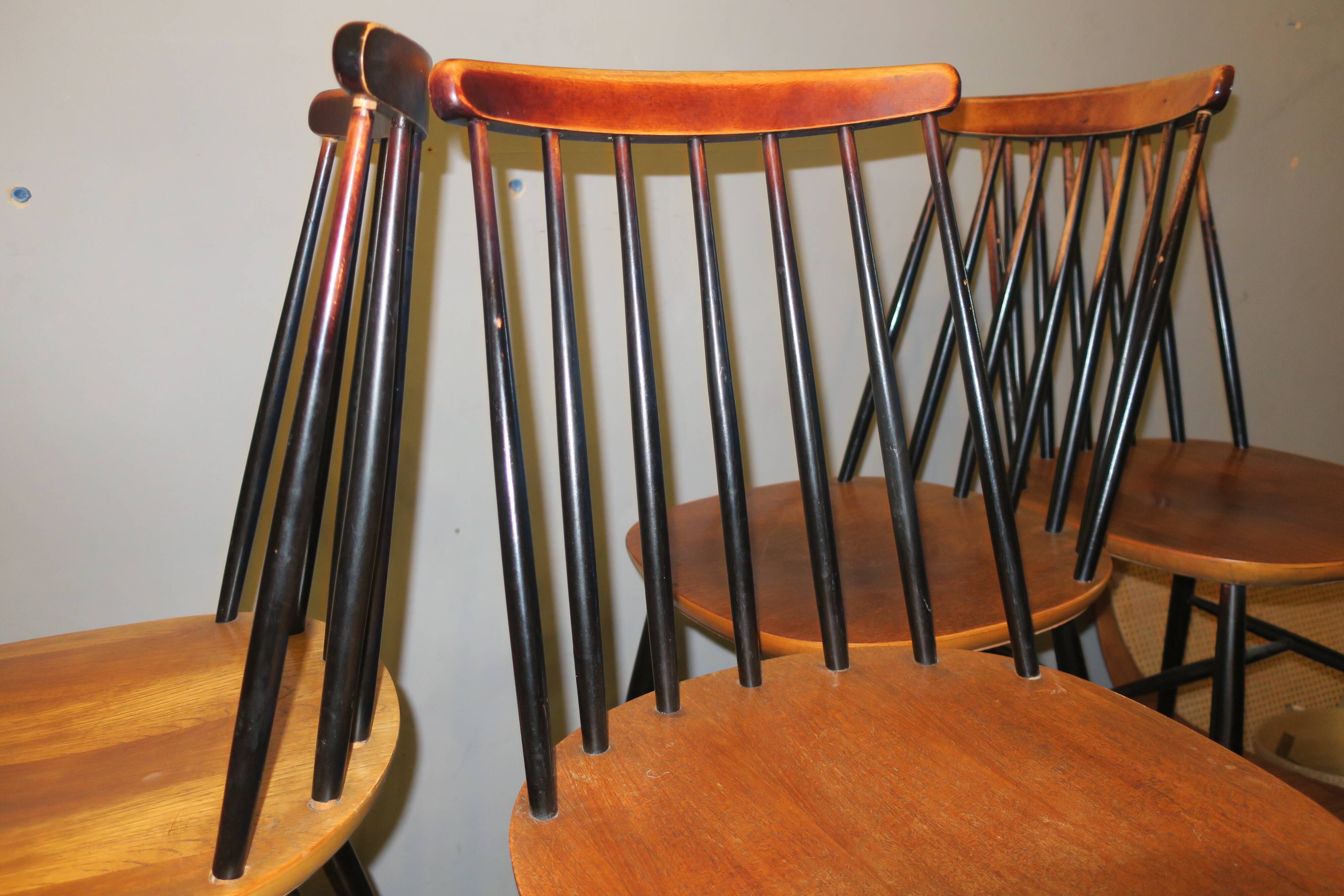 Vintage set of 4 ercol ebonized stick back chairs 1950s
