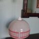 Space age pendant lamp, white opaline with orange silkscreened geometric designs