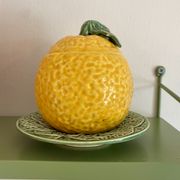 Set of ceramic fruits, a strawberry decanter and two lemon and pineapple jam jars