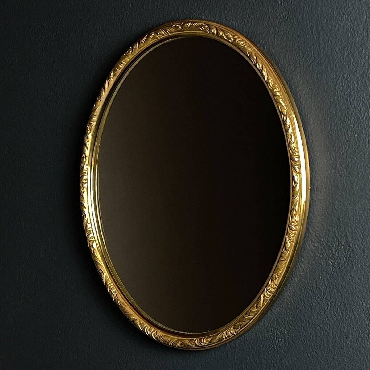 Vintage mirror in a brass frame, Italy, 1950s.