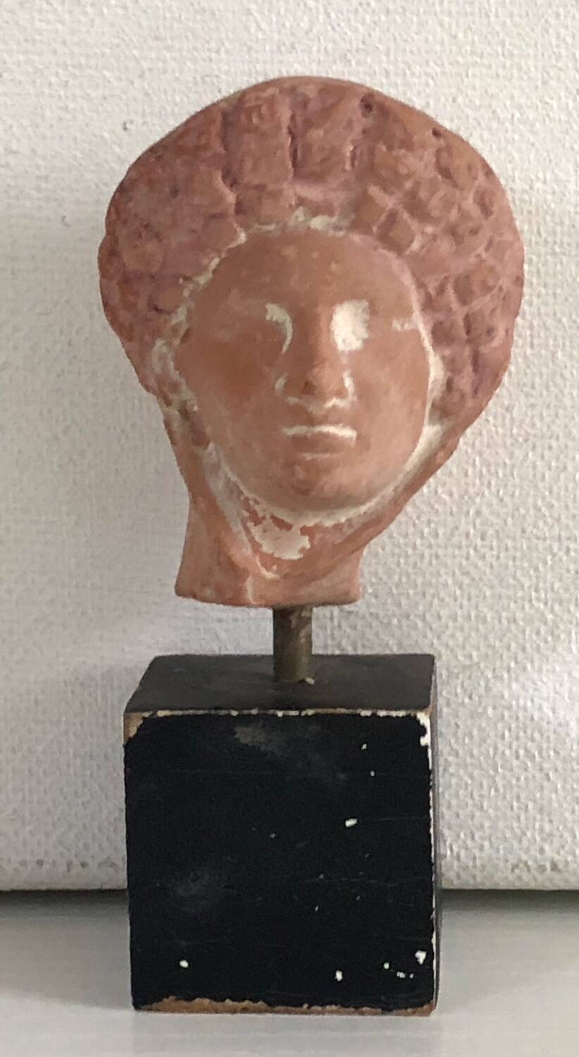 Woman's head in ceramic