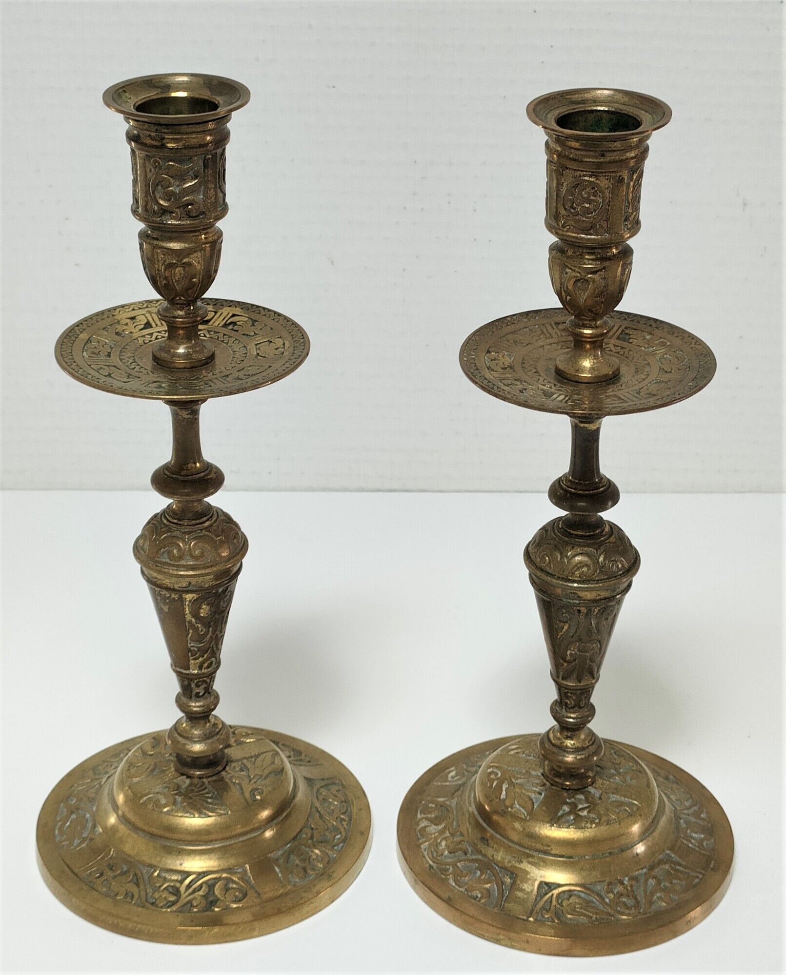 Pair of candle holders patinated bronze floral decoration early twentieth century