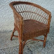 Children's basket chair in vintage braided wicker