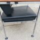 Fauteuil vintage cuir et teck