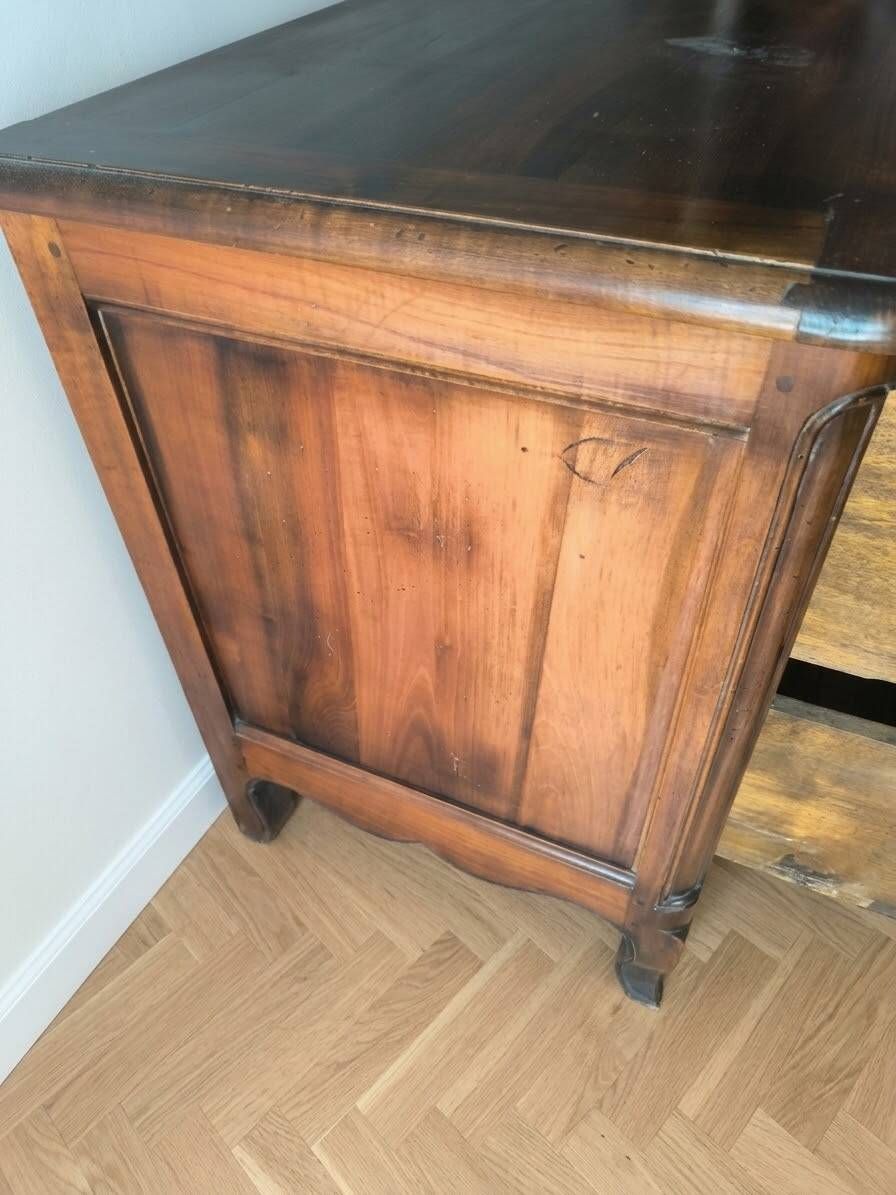 Antique walnut chest of drawers with two drawers.