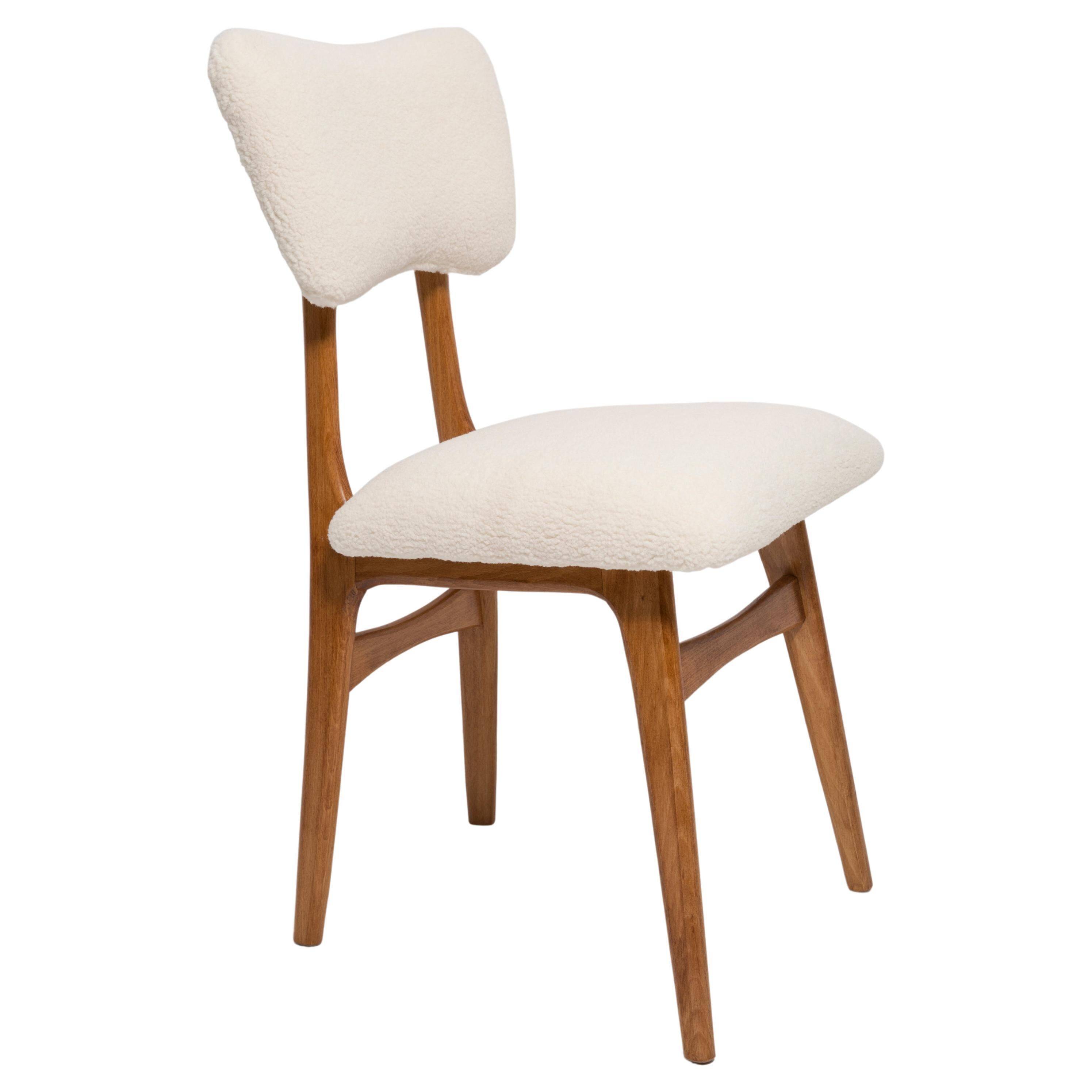 Butterfly chair in beech wood and cream boucle, Europe, 1960