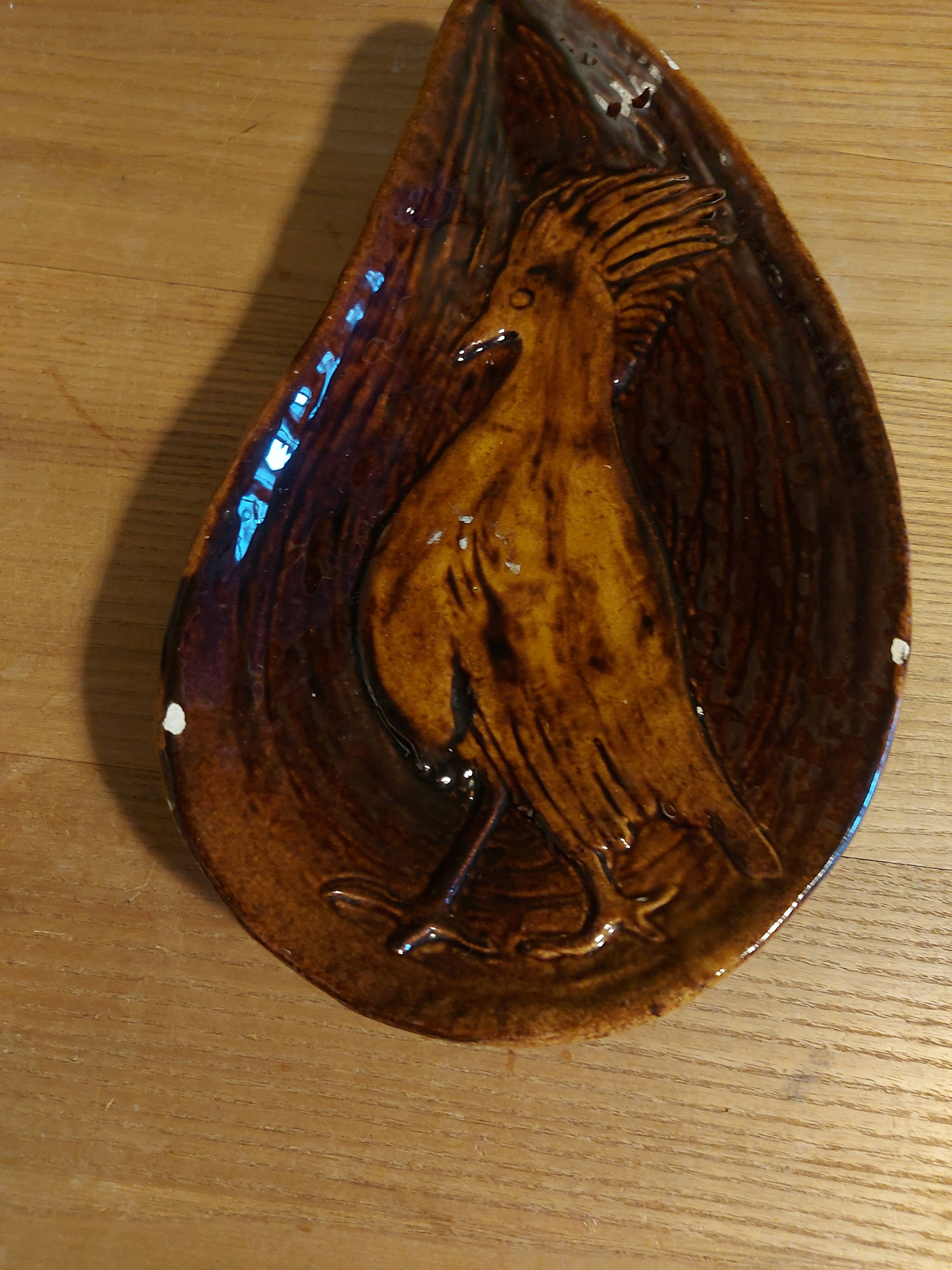 Empty pocket with vallauris bird decoration