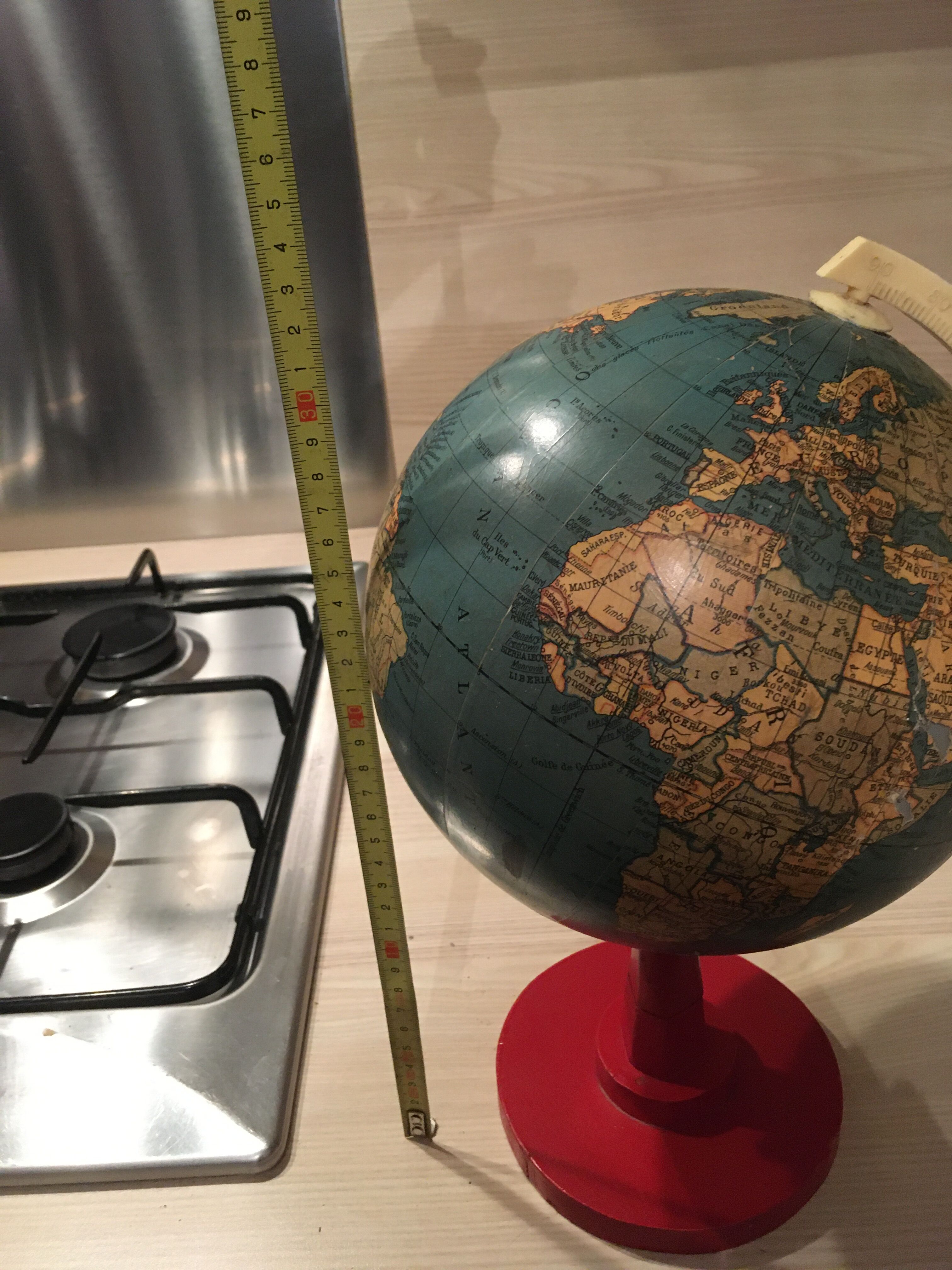 Earth globe ancient wooden foot