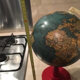 Earth globe ancient wooden foot