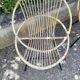 2 Rattan shell armchairs and metal legs
