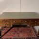 Empire-style minister's desk with swan necks in mahogany.