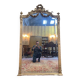 Miroir de style Louis XVI en bois doré