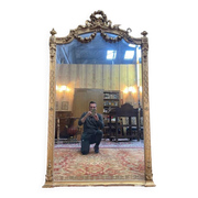 Louis XVI style mirror in gilded wood
