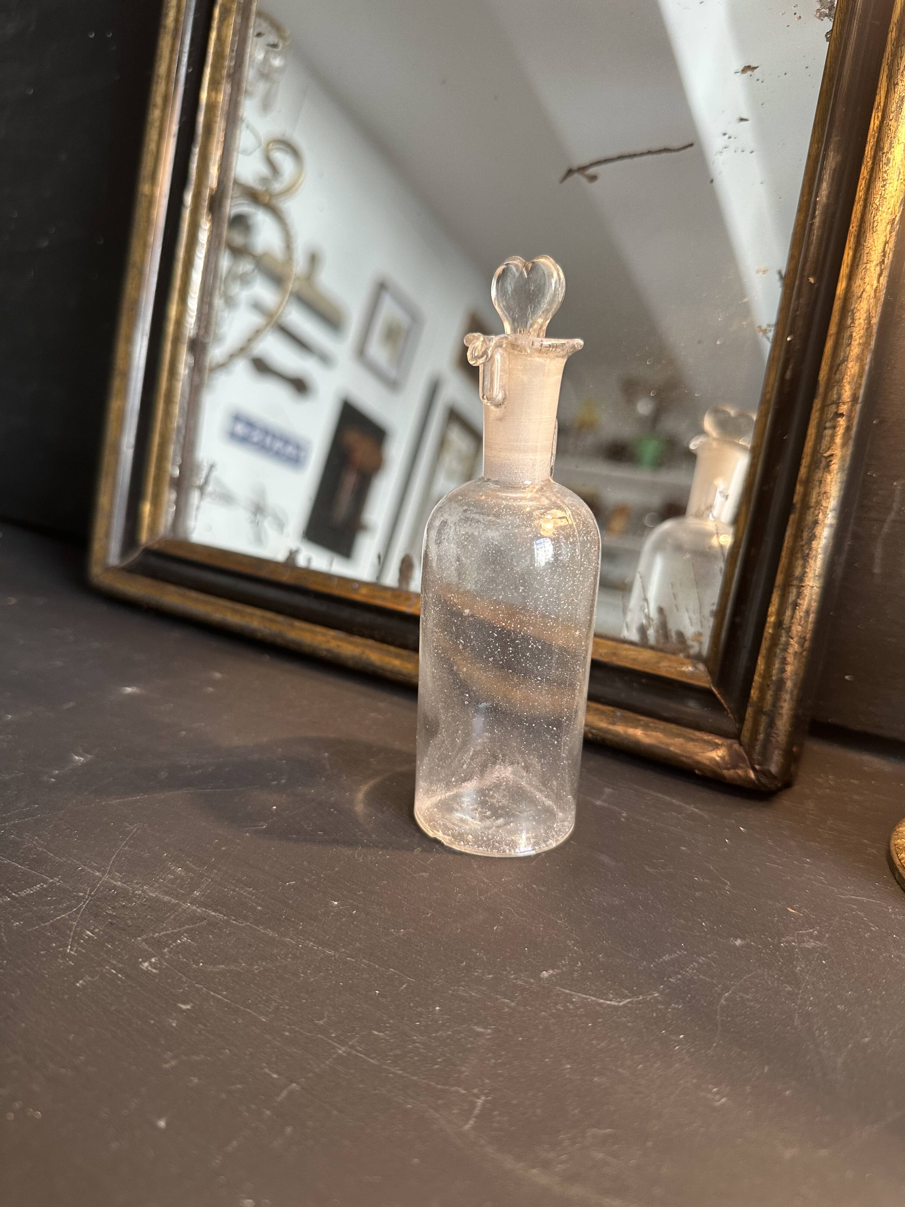 Flacon d’apothicaire ancien en verre, vers 1900