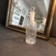 Flacon d’apothicaire ancien en verre, vers 1900