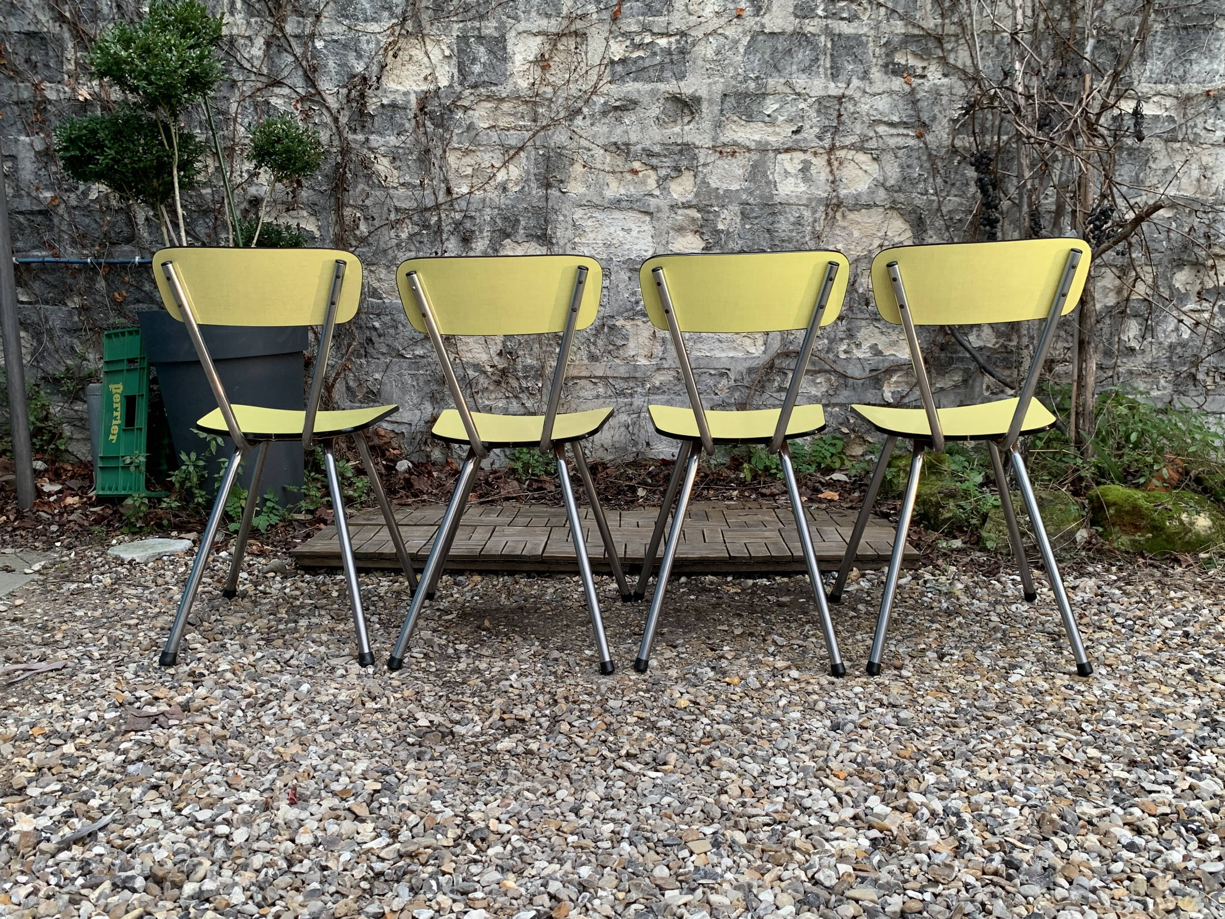 Yellow Formica chairs with compass legs, 1950s