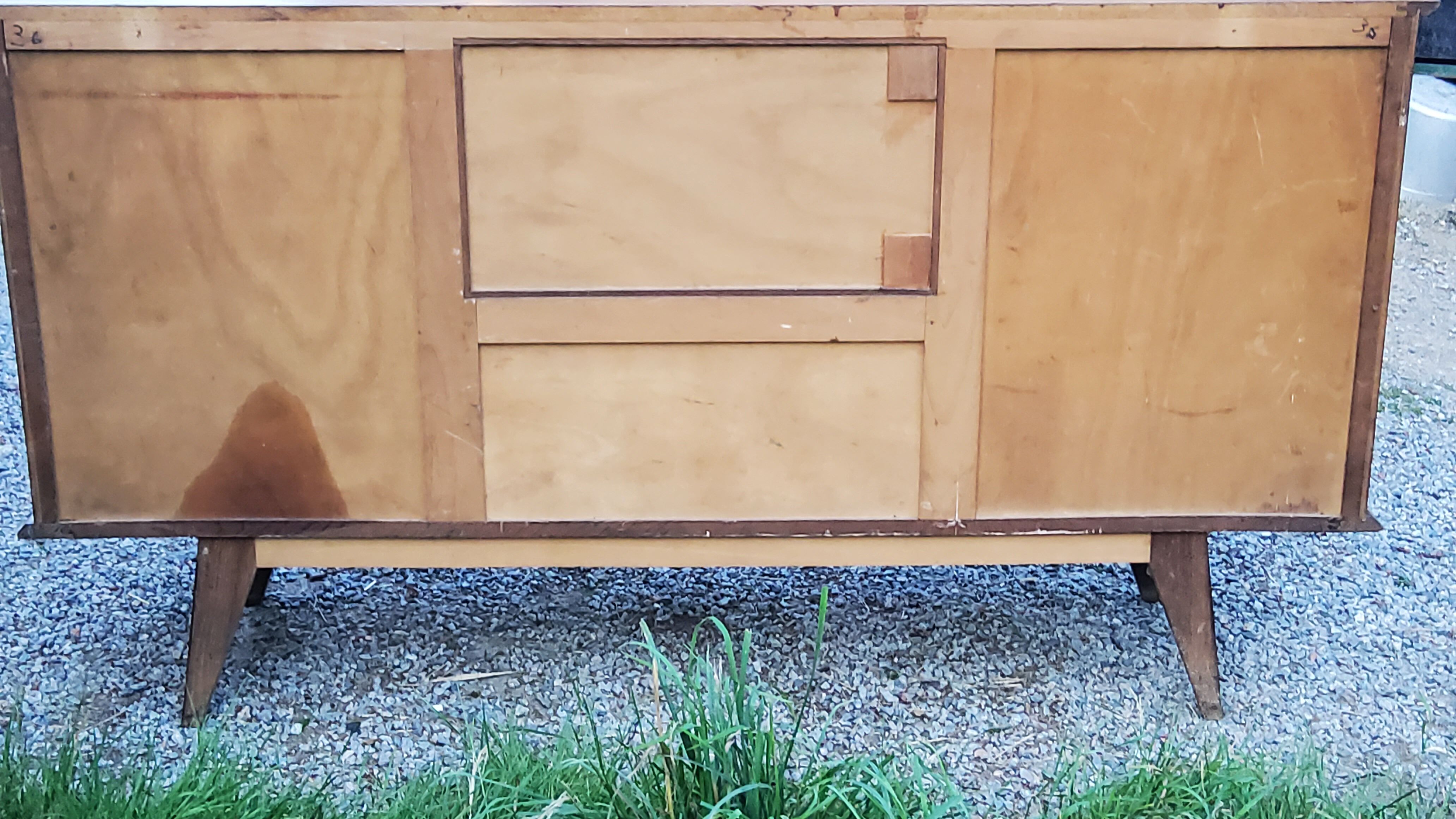 Vintage gold oak row feet compass from the 50s