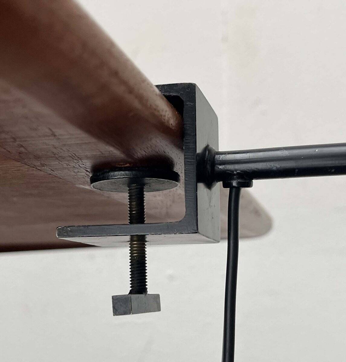 Mid-century minimalist Swiss clamp table lamp by the SLZ team for Swisslamps International, 1960s.