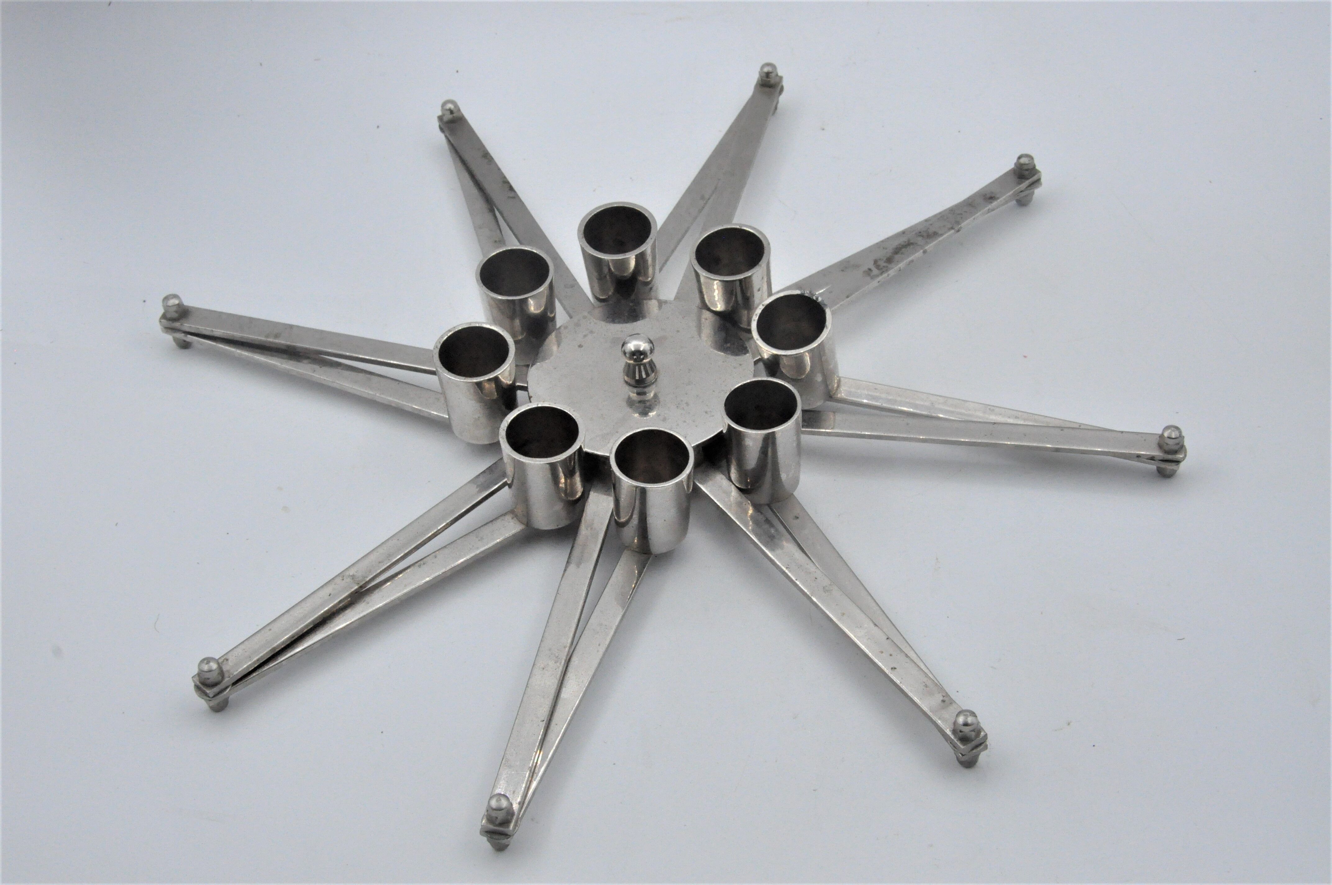Design candle holder in silver metal, with 8 candles, modular spider
