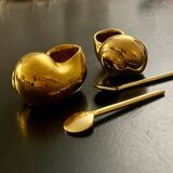 2 Snail-shaped salt pots in gold-colored porcelain