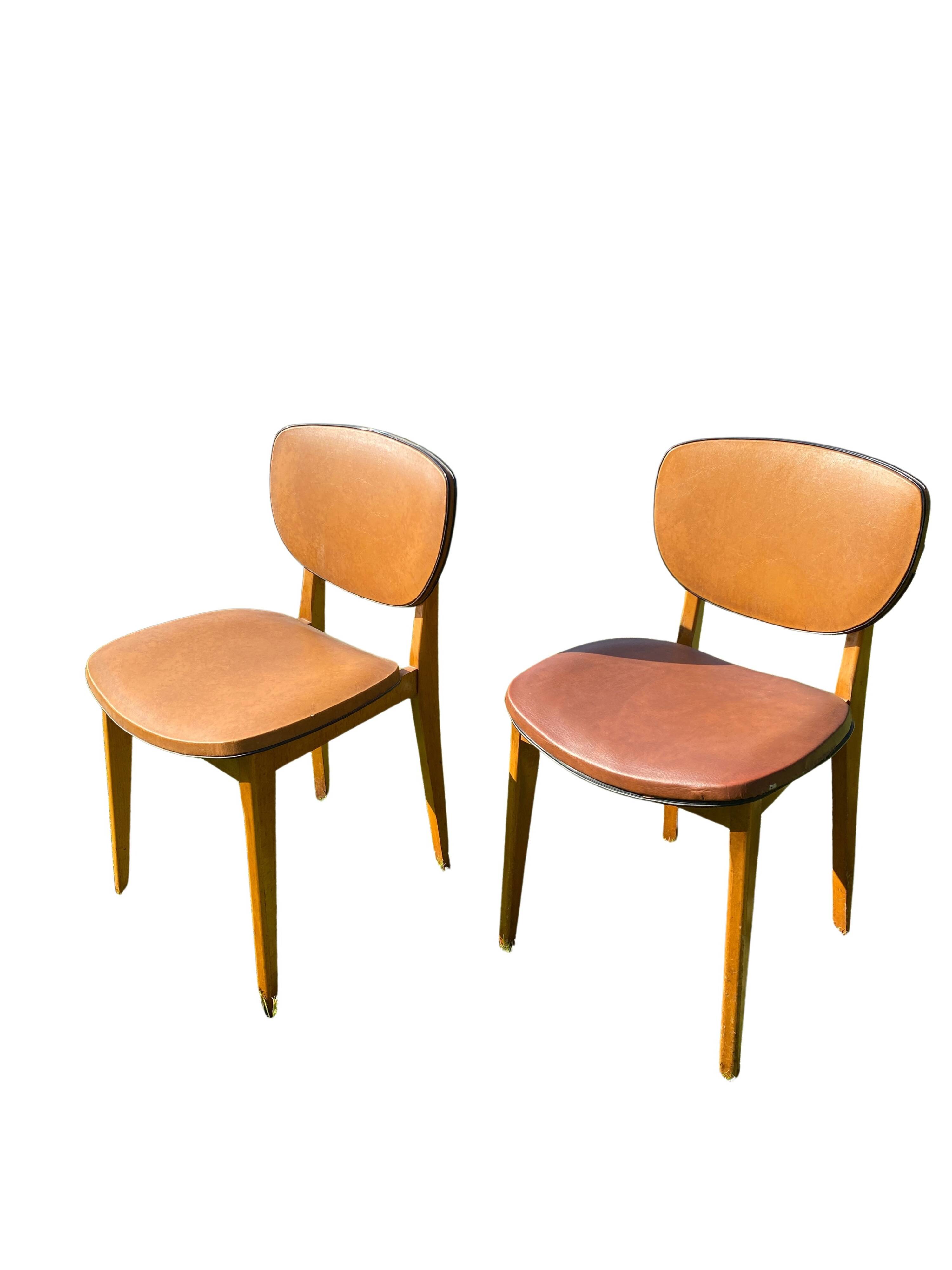 Pair of Scandinavian wood and leather chairs, Circa 1960