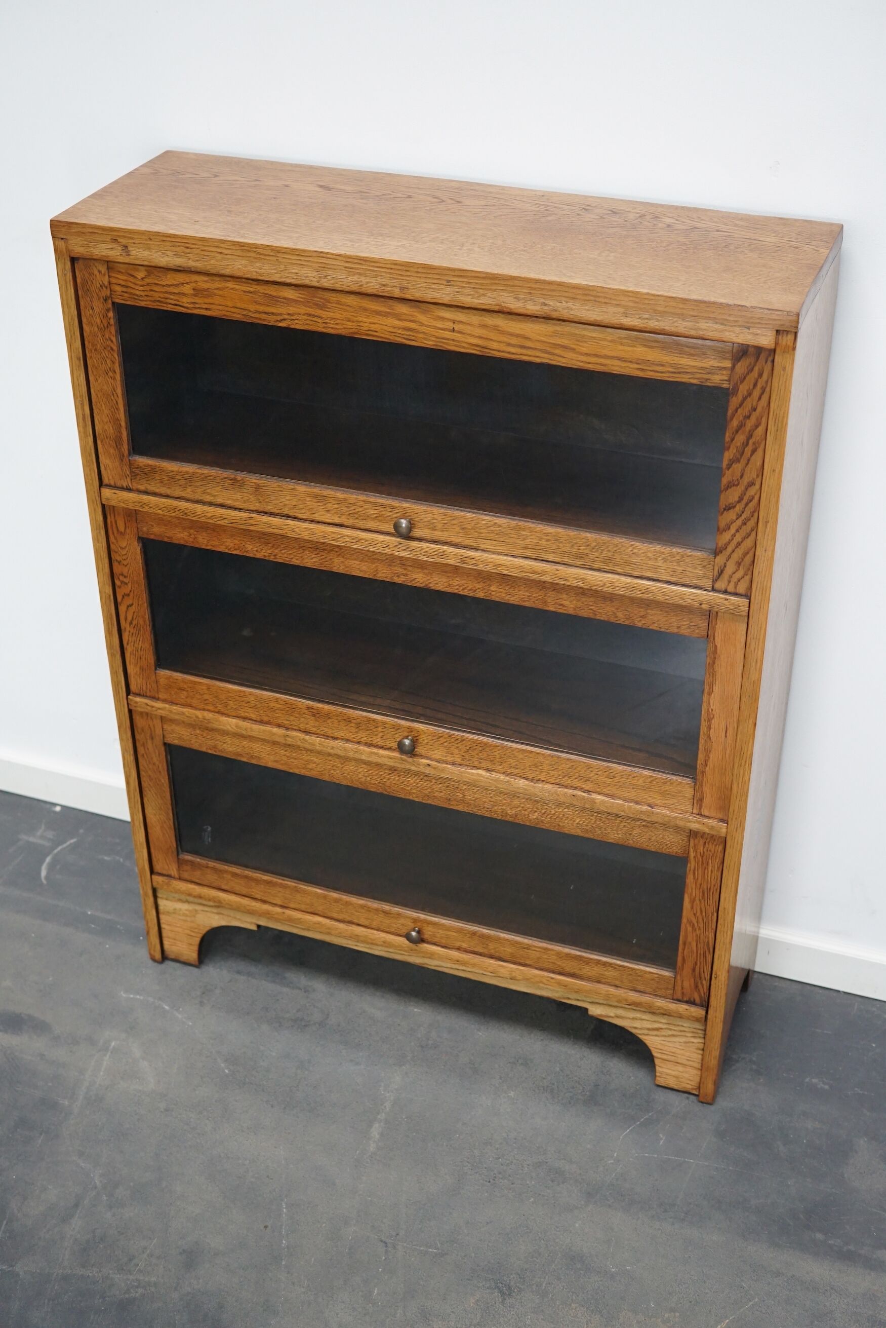 German Oak Bookcase with Folding Doors In Style of Globe Wernicke, ca 1930s
