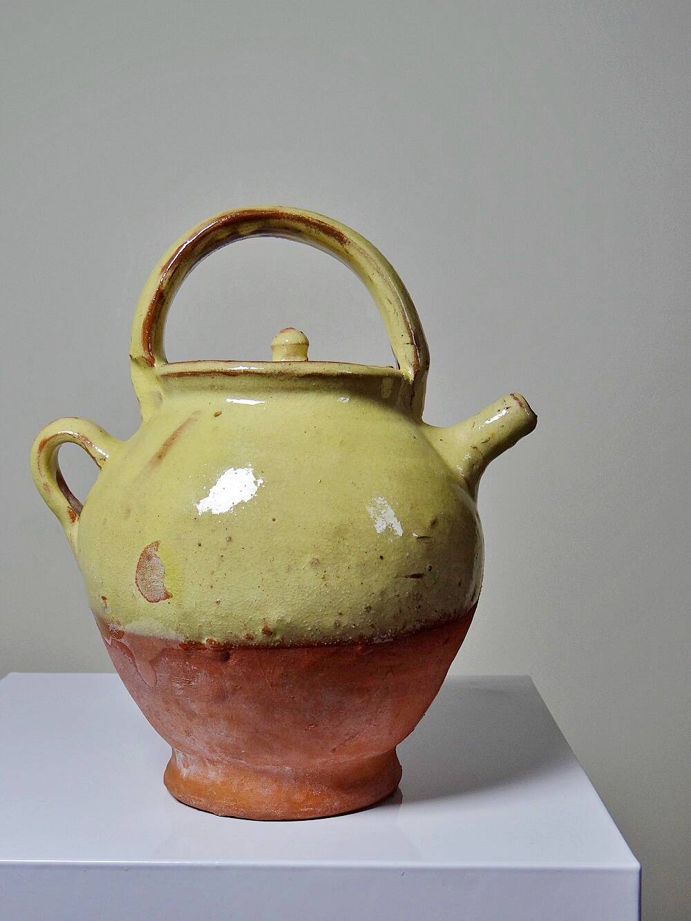 Small vintage pale yellow enamelled terracotta goat jug