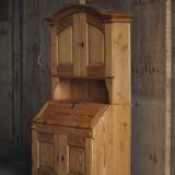 Old Danish secretary in pine with drop-down front and upper cabinet, mid-19th century.