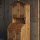 Old Danish secretary in pine with drop-down front and upper cabinet, mid-19th century.