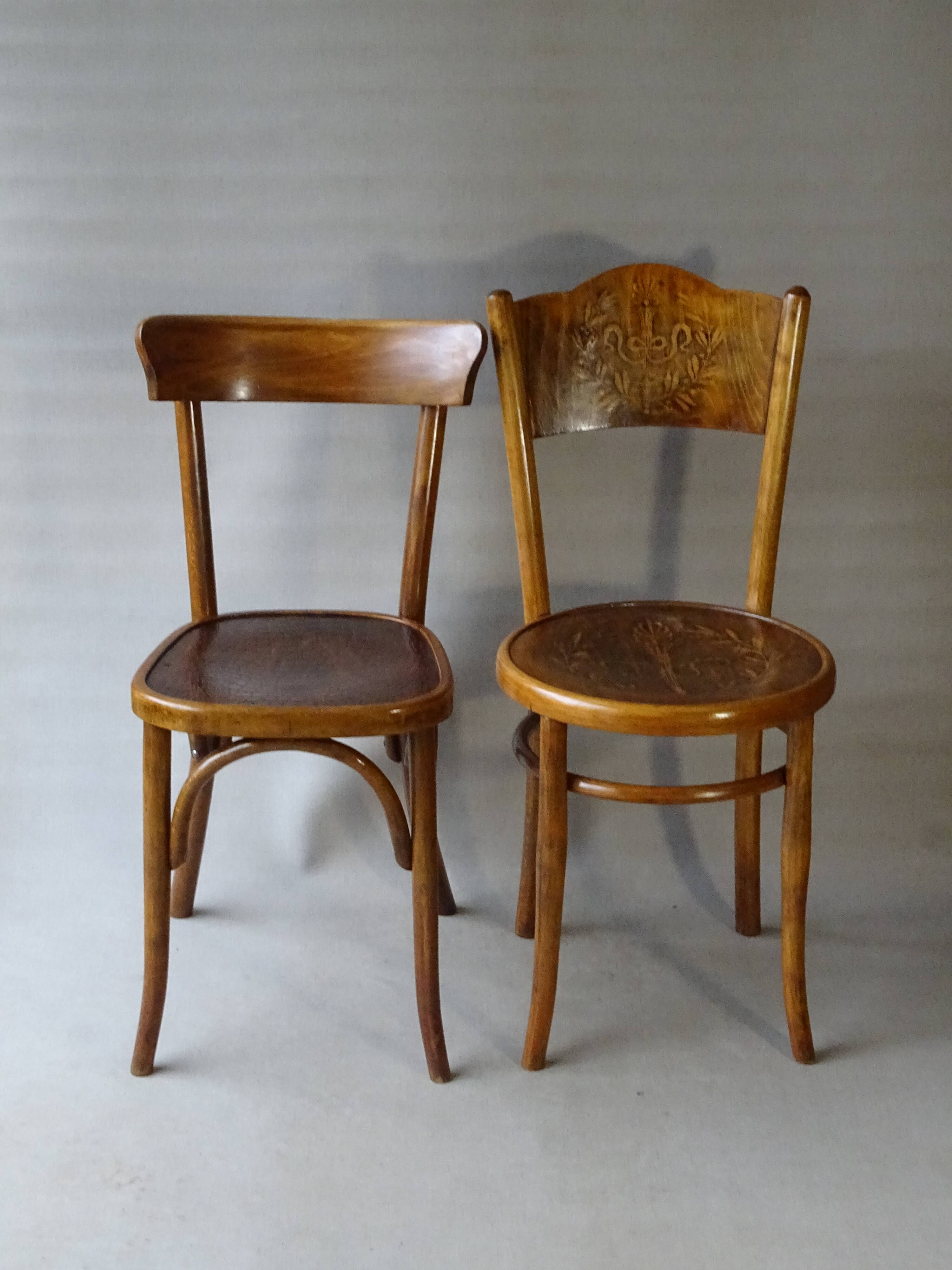 Set of 36 mismatched Bistrot chairs, 1920 to 1950, wooden seats.