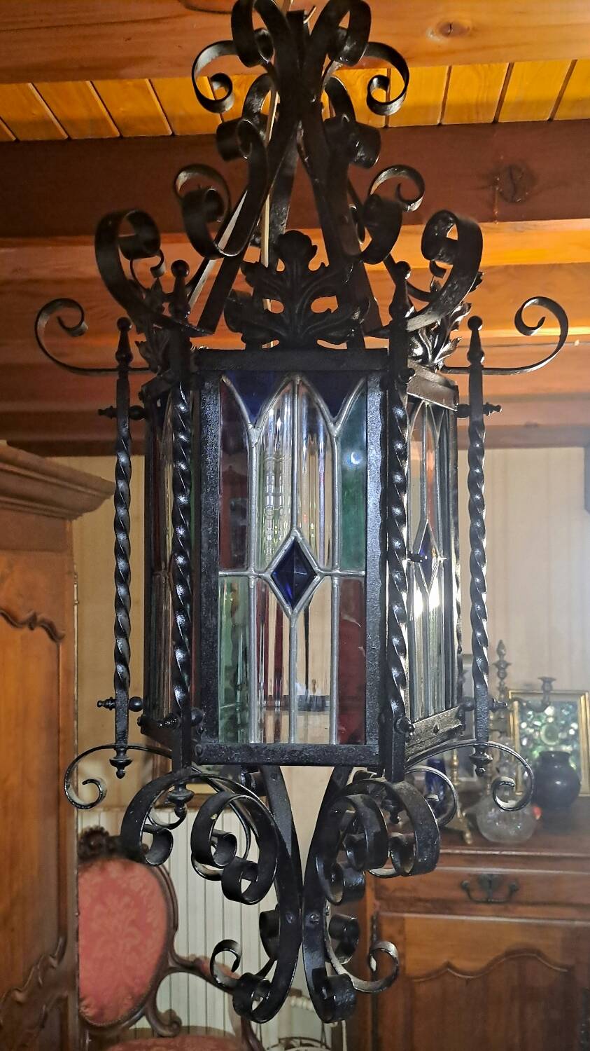 Wrought iron lantern with colored stained glass