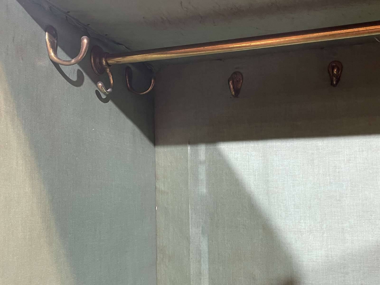 19th-century English mahogany three-door wardrobe.