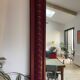 Large antique moulded mirror in wine red / plum (101 x 74 cm)