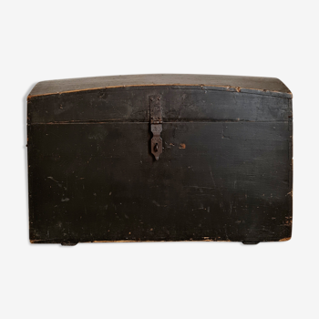 Old chest in black wood