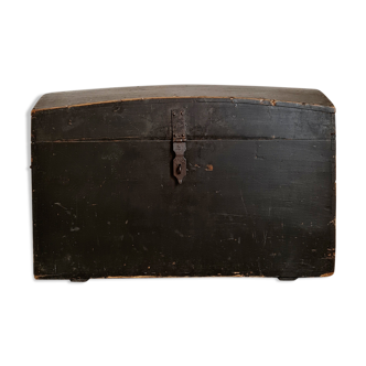 Old chest in black wood