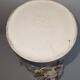 Vintage Italian white ceramic vase with raised floral decoration.