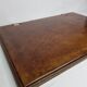 Underhand in saddle leather and vintage brushed metal