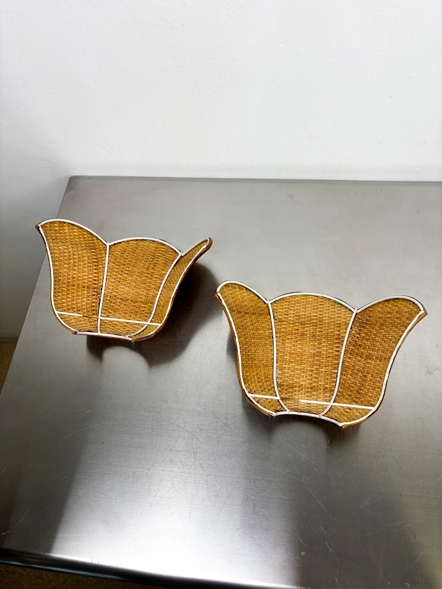 Pair of vintage woven rattan wall shades, Italy 1970s