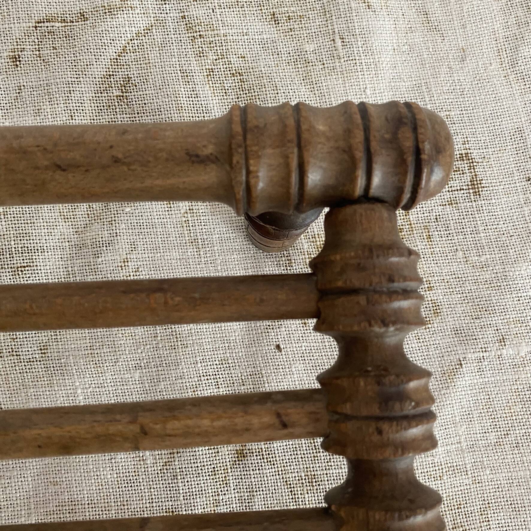 Old low turned wooden stool