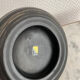 Vintage black round ceramic ashtray