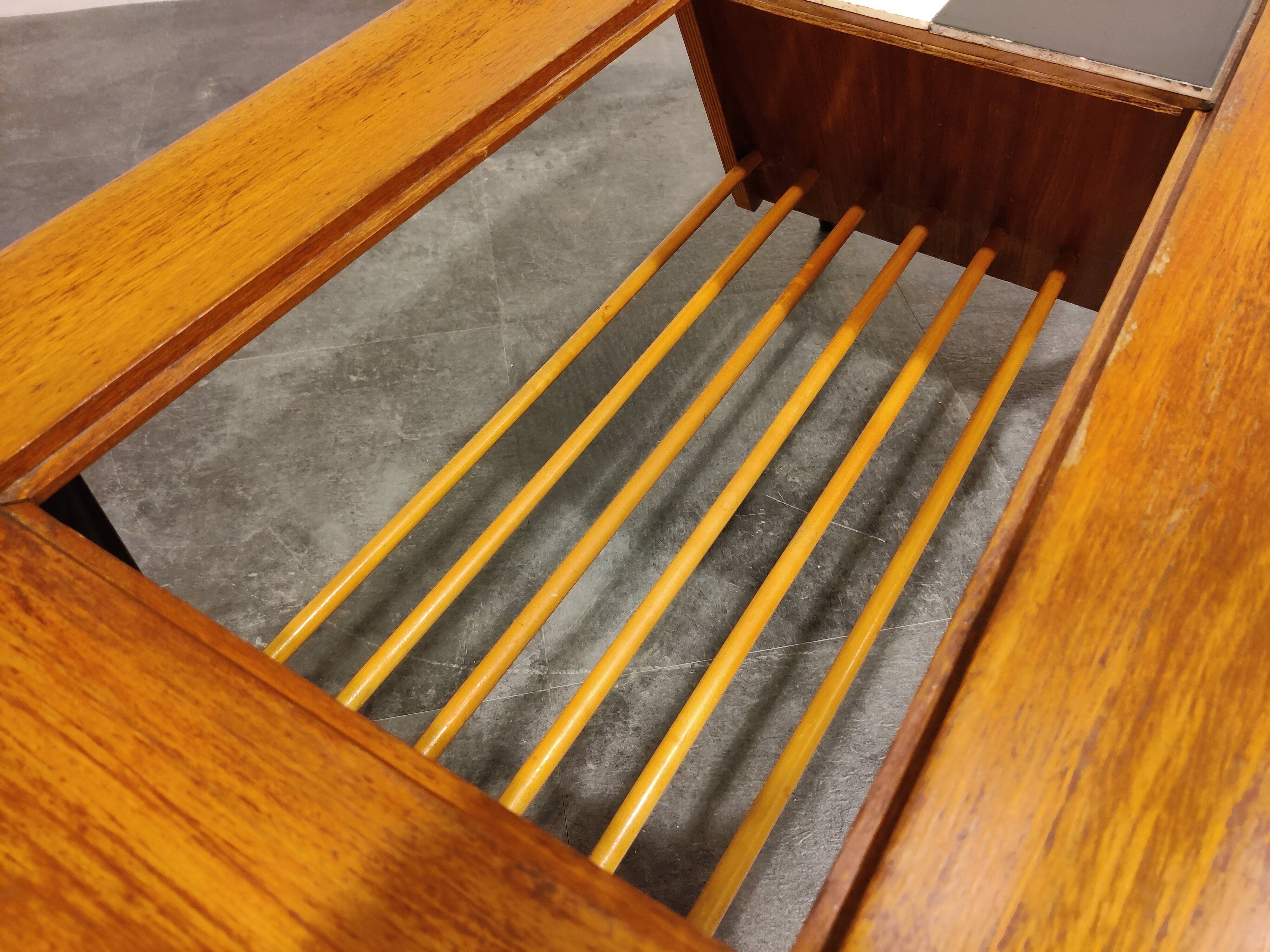 Vintage hidden bar coffee table by Alfred Hendrickx for Belfom, 1950s