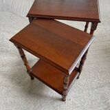 2 wooden nesting tables with molded legs