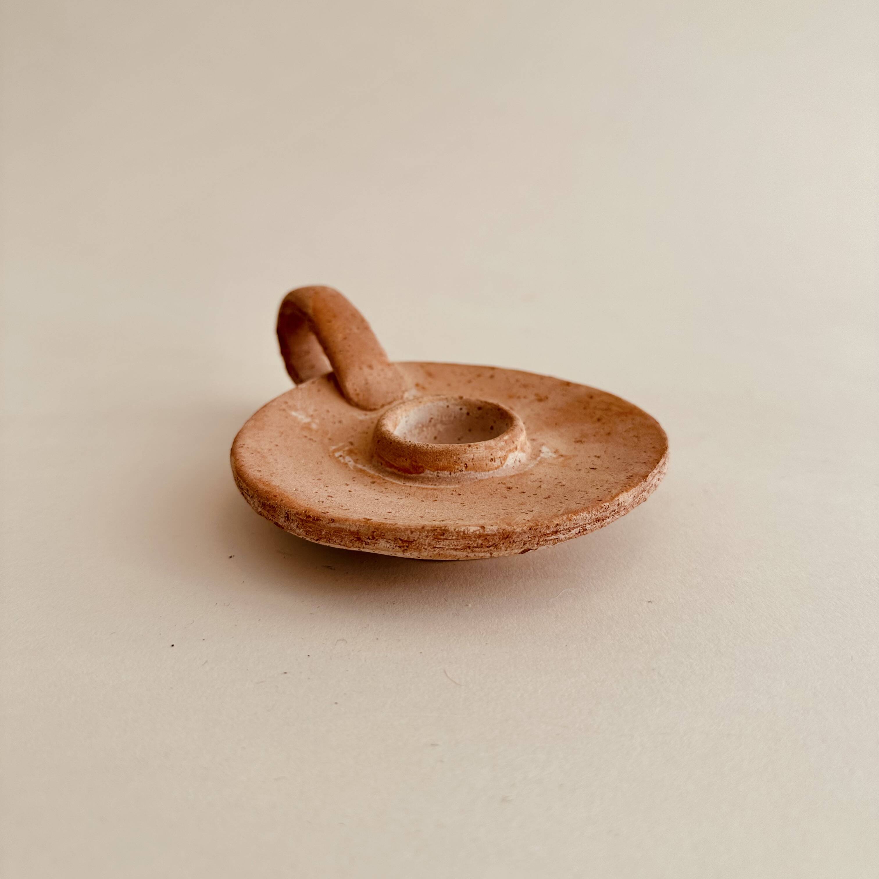 Terracotta candle holder