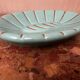 Art Deco ceramic pocket vase in celadon green and gold, style Arthur Percy L34/P22.