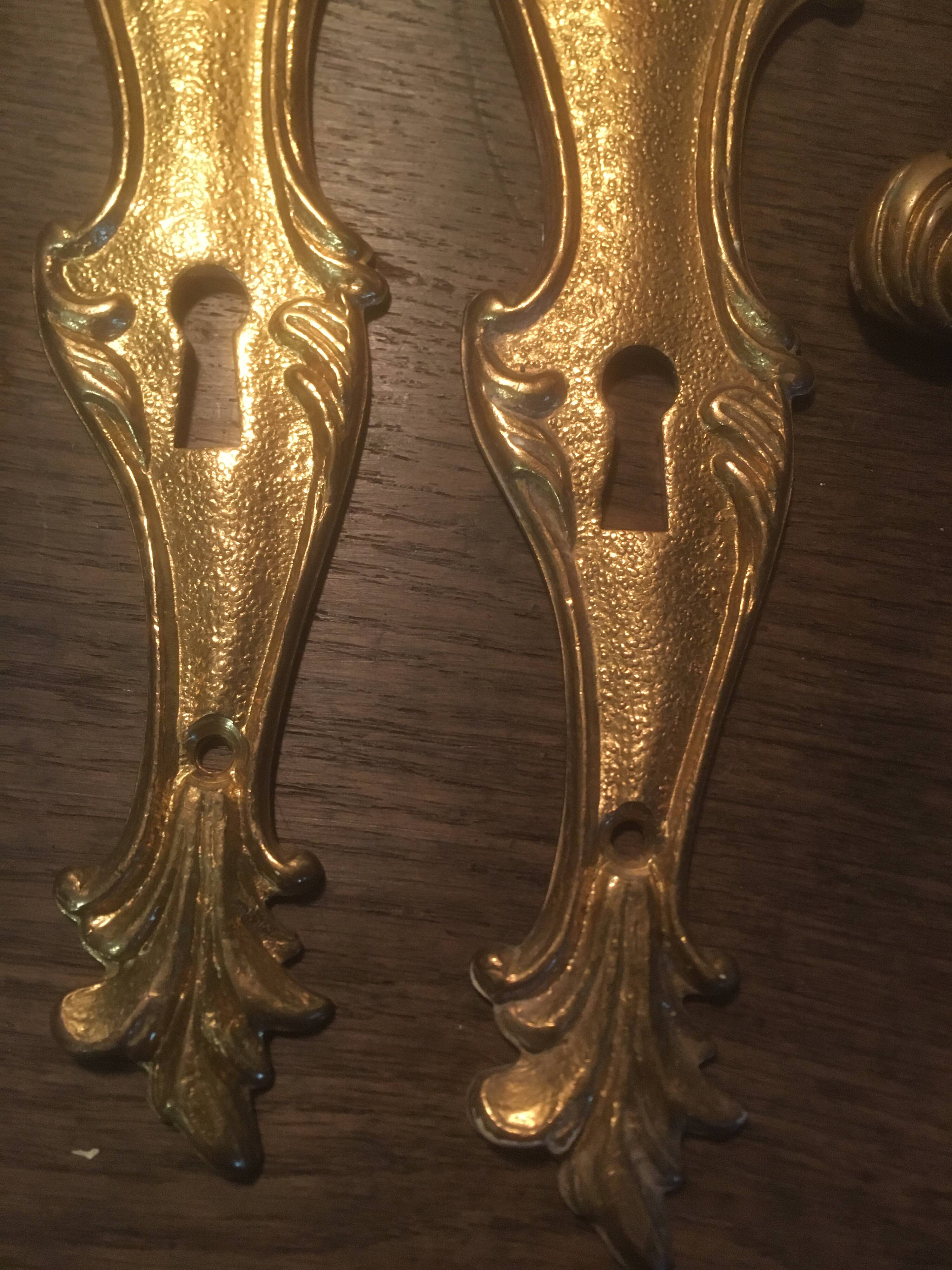 Louis xv style brass crutches and plaques