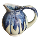 Blue and green glazed ceramic ribbed pitcher