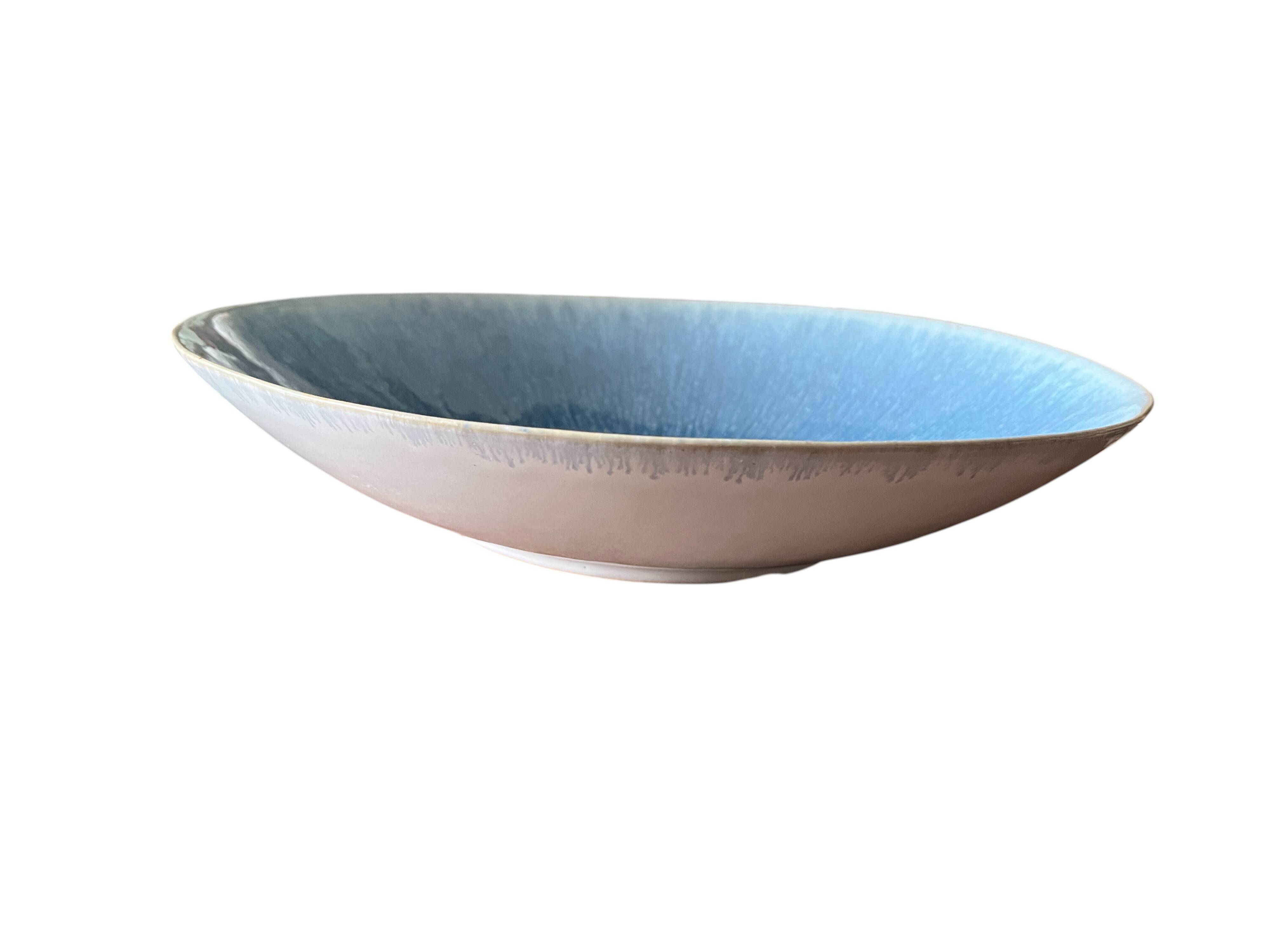 Large blue artisanal ceramic shallow dish from the 20th century.