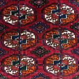 Bukhara rug with 12 panels in wool and burgundy silk, 88 x 54 cm.