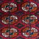 Bukhara rug with 12 panels in wool and burgundy silk, 88 x 54 cm.